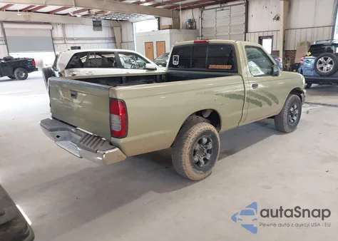 1998 Nissan Frontier Xe z USA, uszkodzony, nr VIN 1N6DD21Y6WC338111